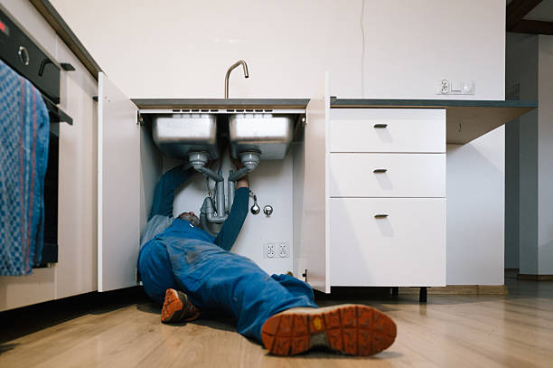 Professional Drain Cleaning technician working in Helmetta, NJ